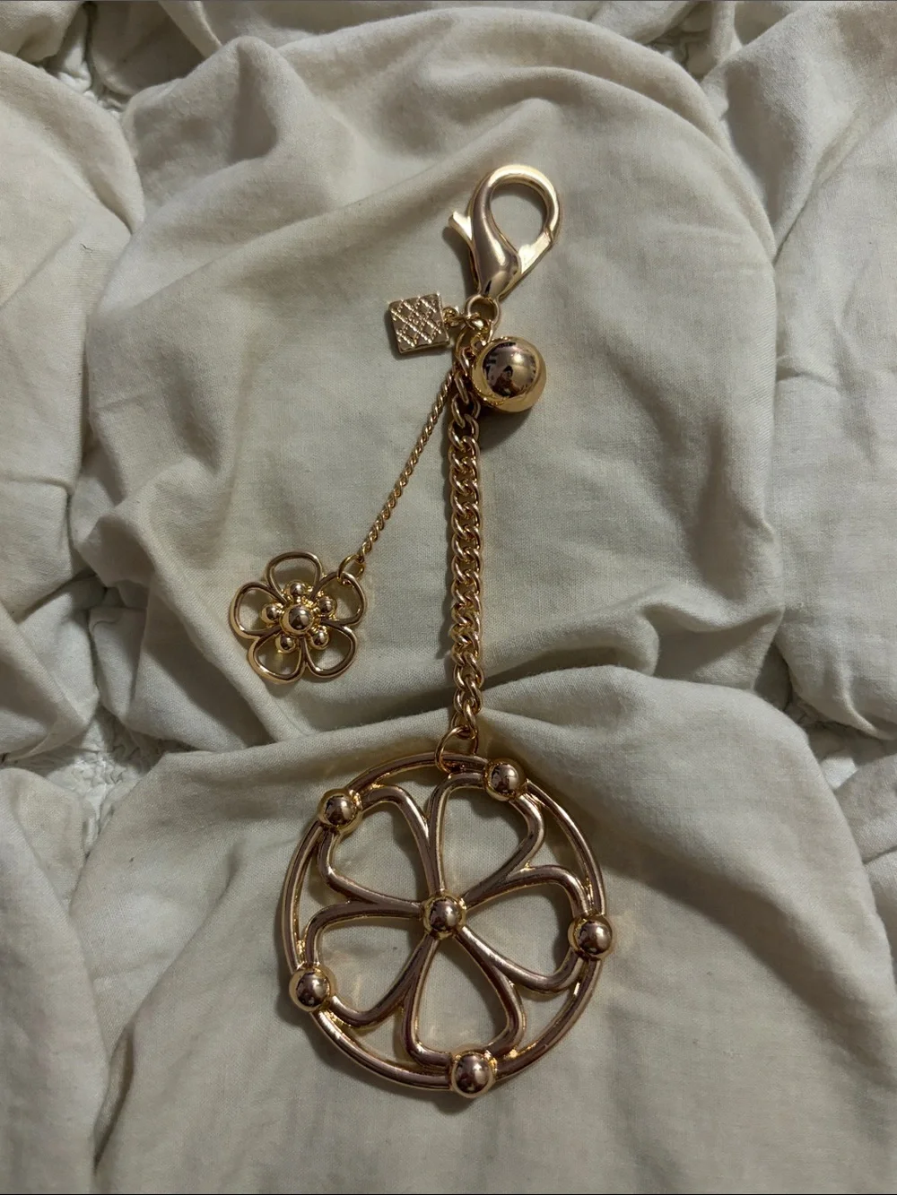 Free People Gold Tone Open Floral Medallion Charm Bag Charm Keychain Boho Chic